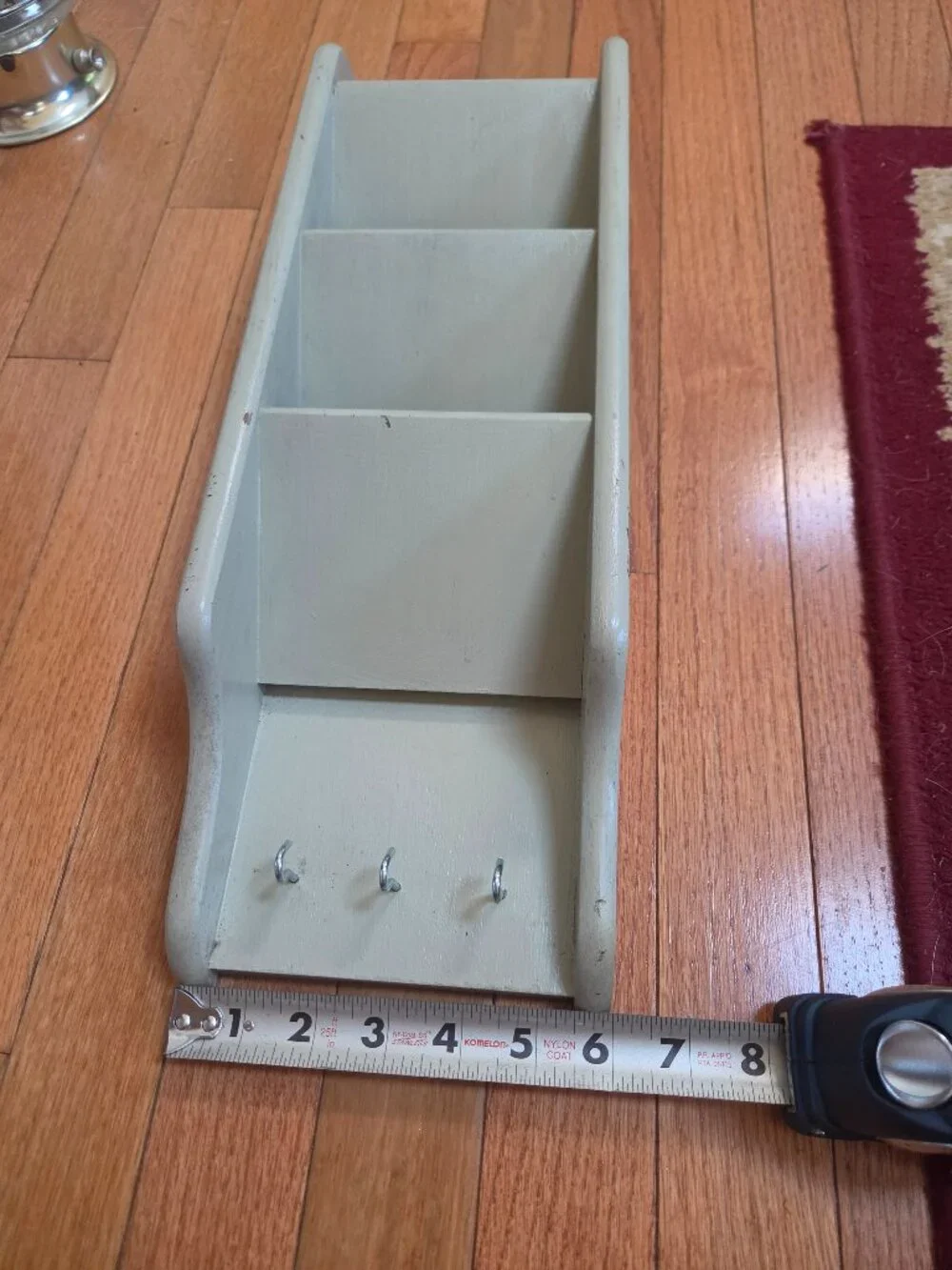 wall mounted wooden organizer with slots for mail letters and three hooks keys,